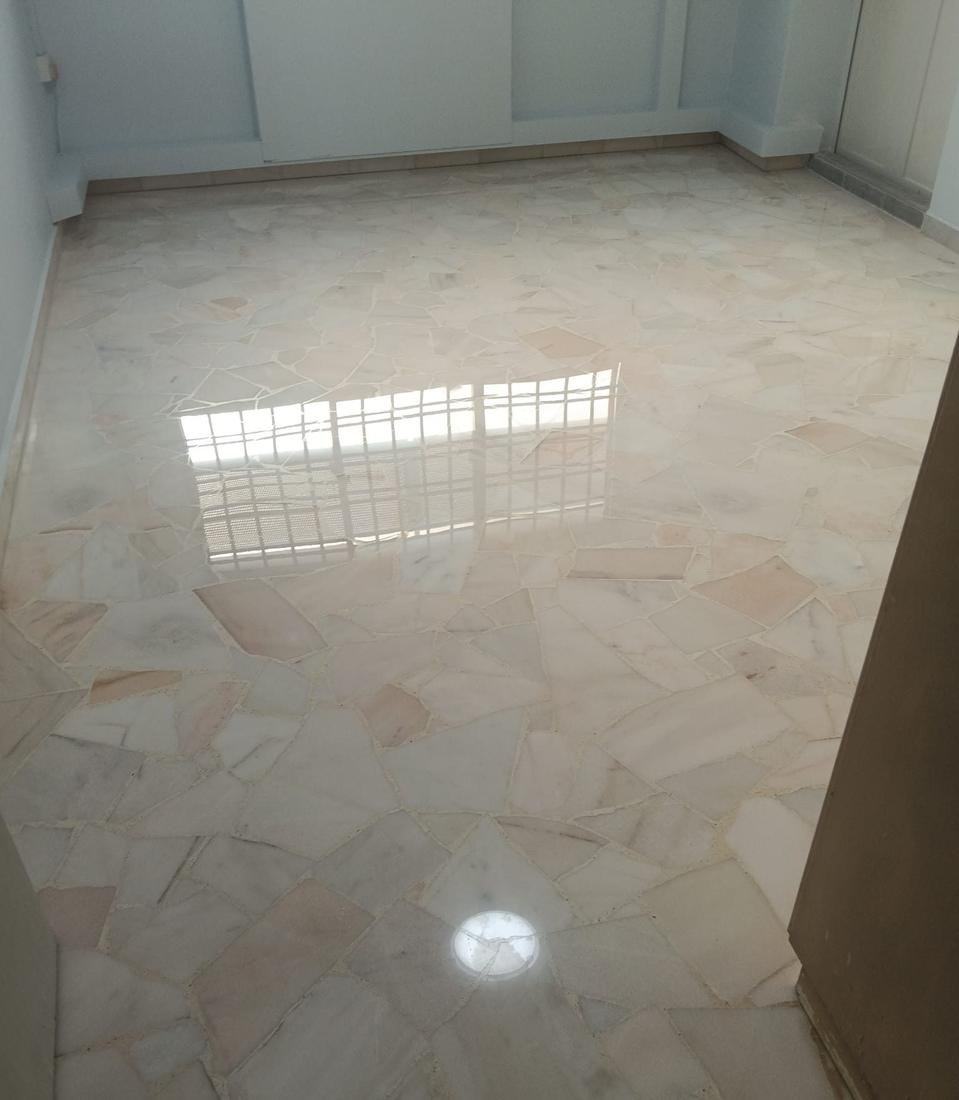 Crazy-paving marble bedroom floor polished