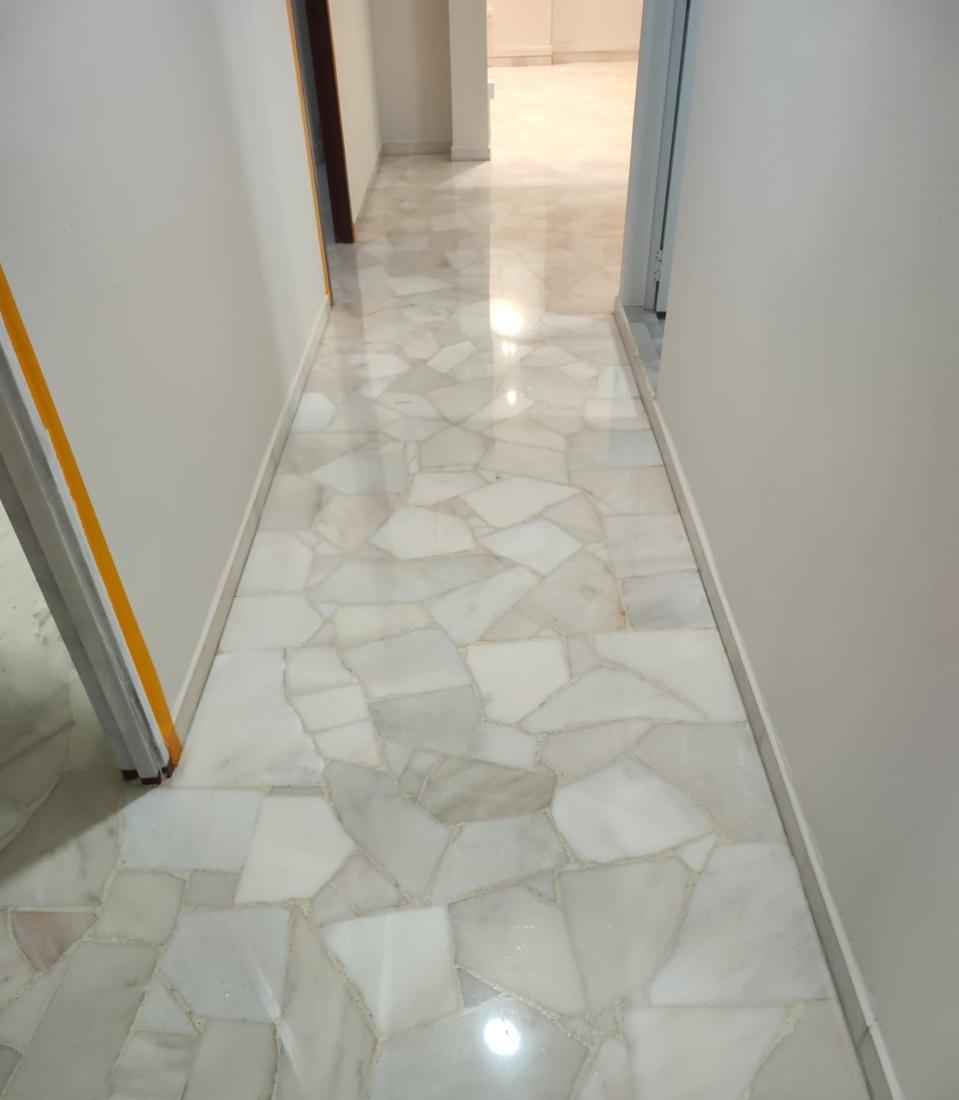 Crazy-paving marble corridor after polishing