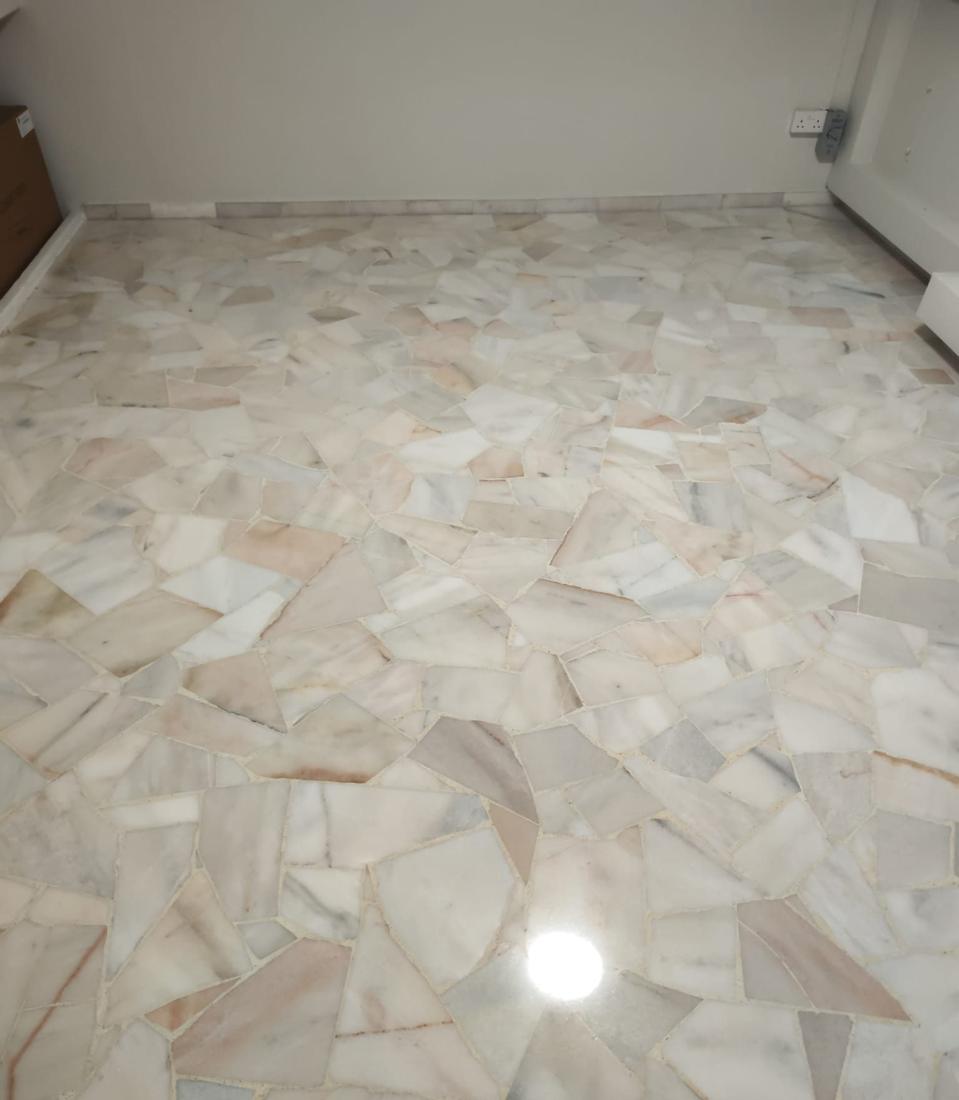 Crazy-paving marble room floor after polishing
