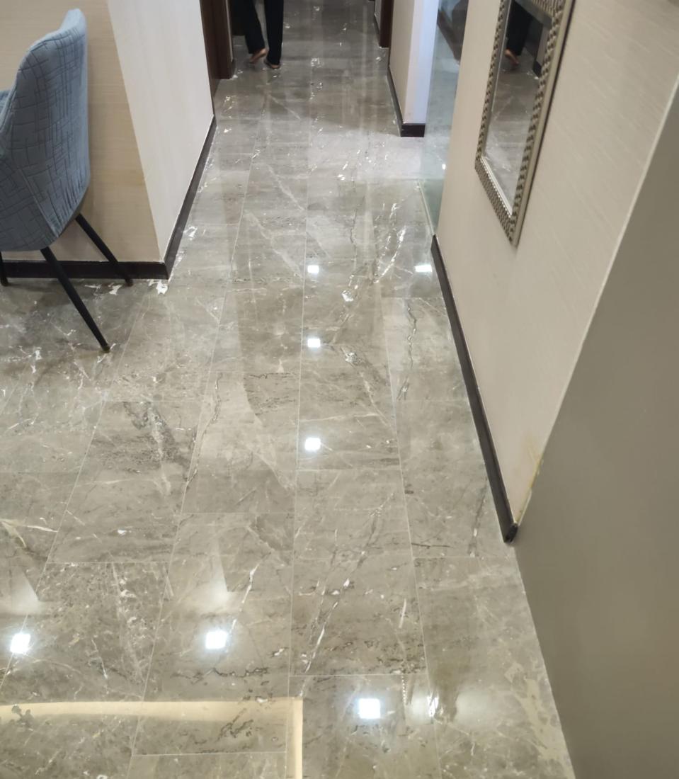 Grey marble hallway with a mirror finish
