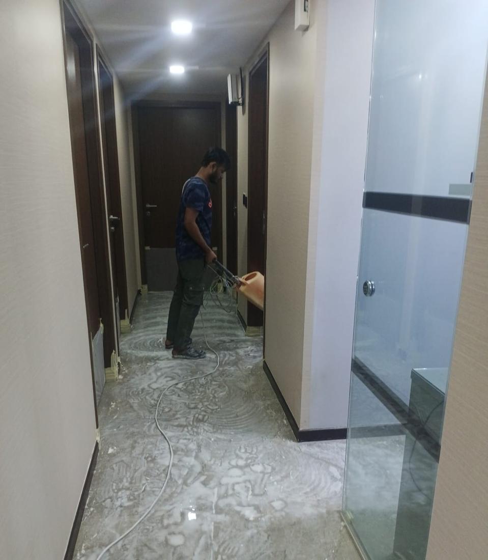 Marble polishing in a corridor leading to the bathroom