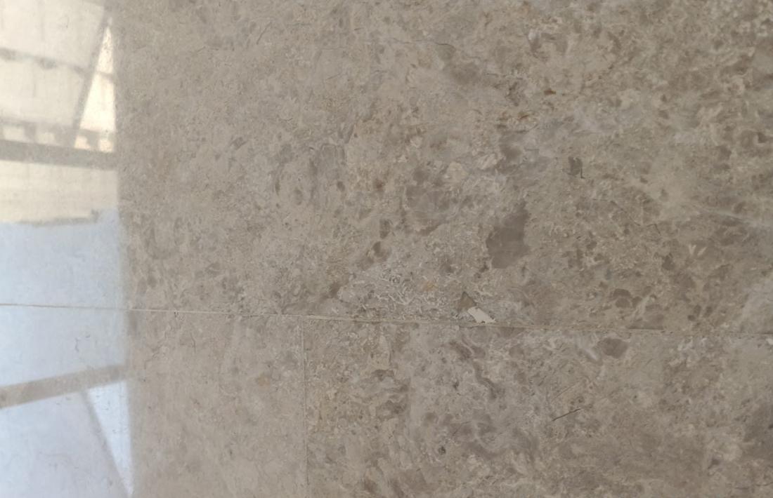 Close-up of worn marble with lost shine